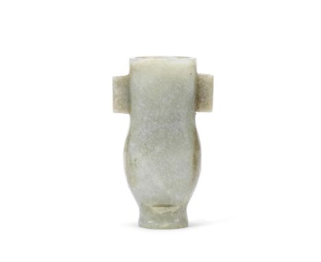A SMALL CELADON JADE ARROW VASE19th centuryThe slightly waisted body rising from a narrow foot and rising to a wide cylindric