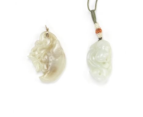 TWO JADE FISH CARVINGS18th/19th centuryOne carved in the round as a catfish, the body coiled over a lingzhi fungus, the other