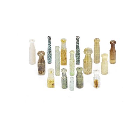 A LARGE GROUP OF JADE, HARDSTONE AND METAL MOUTHPIECES19th/20th CenturyTwo with turquoise insets, three with carved decoratio