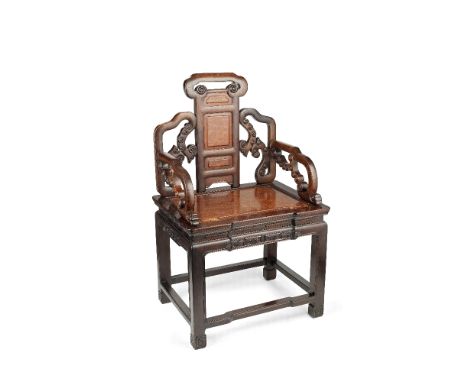 A BURL WOOD INSET HONGMU ARMCHAIR19th/20th centuryThe back splat divided with four burl wood panels surmounted by a ruyi-shap