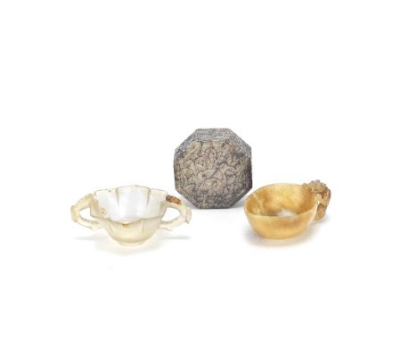 THREE HARDSTONE CARVINGSMing Dynasty or laterComprising: a jade pouring vessel with a chi dragon perched over the rim forming