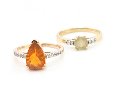 Two hallmarked 9ct gold and gem set rings. The rings to include a hallmarked 9ct gold fire opal and white zircon ring, hallma