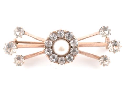 A 19th century 8ct rose gold, paste and simulated pearl set brooch pin. The brooch pin set with a central simulated pearl sur