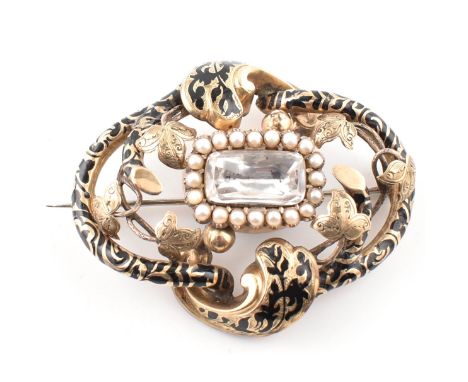 A 19th century gold, pearl and paste mourning brooch pin. The antique mourning brooch pin having a central white paste stone 