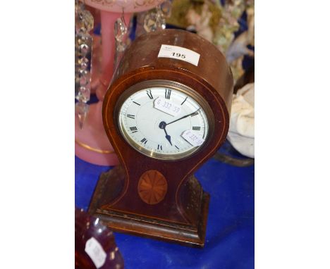 Edwardian mantel clock in mahogany balloon type case