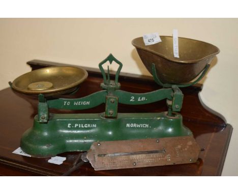 Pair of vintage scales marked E.Pilgrim Norwich together with a set of brass mounted pocket balance scales (2)