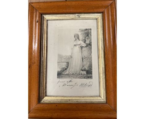 A framed print of an engraving of a lady 
