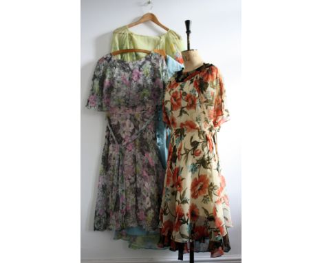 Four vintage 1970s ladies garments. A grey/pink floral chiffon dress (26 inch waist), a floral print maxi (26 inch waist), a 