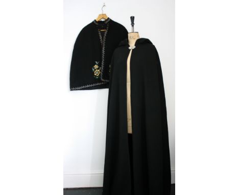 Two vintage 1960s cape and cloak. A heavy, long, wool, hooded cloak and a short, embroidered wool cape. Both in very good con