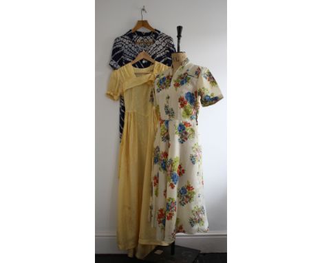 Three ladies vintage 30s/40s dresses comprising of a 30s/40s print day dress (minor pin holes), a 40s blue/white print dress 