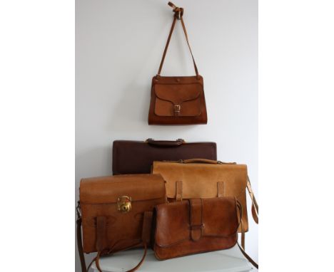 A collection of 5 vintage 1960s/70s tan leather bags, satchel and briefcase. Including a leather  camera box bag, two smaller