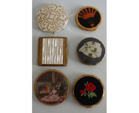 A collection of vintage compacts and a 1950s compact, black satin evening bag. Includes 2 x STRATTON compacts (one is a mirro