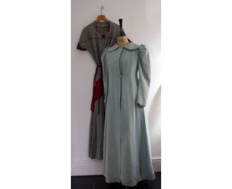 Two vintage garments comprising of a 1930s sea green full length, moire grosgrain coat with padded and puffed shoulders and a