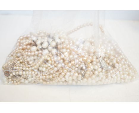 Bag of pearl necklaces 