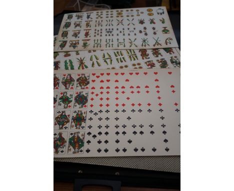 Large album of uncut early playing cards 