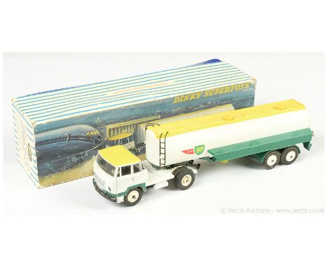 French Dinky 887 Tracteur Unic Semi-Remorque "Air BP" finished in white, yellow, green, plastic hubs - overall condition is g