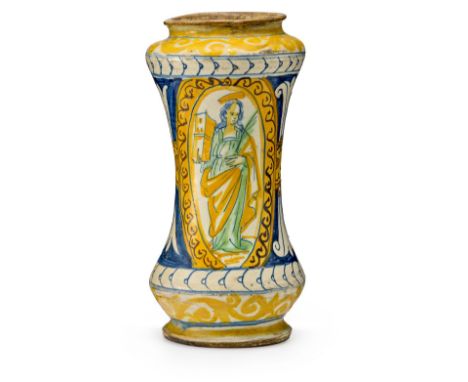 Großer Albarello  Palermo, 17. Jh. Majolika, graubeiger Scherben. Bemalt mit Hl. Barbara in Medaillon und Schild-Rankenfries.