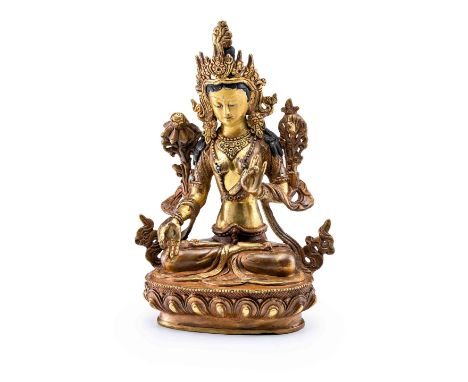 Sitatara  Tibet, 19. Jh. Bronze, tlw. bemalt. Die weiße Tara mit seitlich aufsteigenden Blütenstielen auf Lotosthron sitzend.