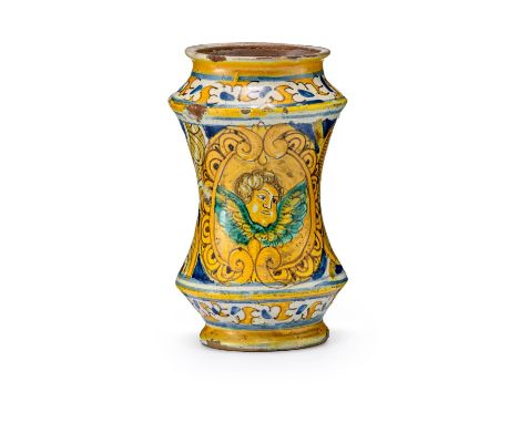Kleiner Albarello  Palermo, 17. Jh. Majolika, braunbeiger Scherben. Bemalt mit Cherubinköpfchen in Kartusche. Umlaufender Dek
