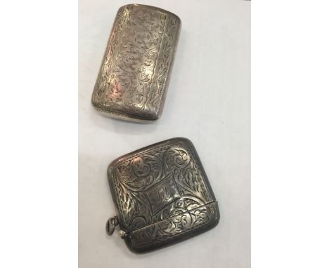 A silver snuff box, Birmingham 1895: maker's mark H & T; together with a large silver vesta case, Birmingham 1918 by J G Ltd