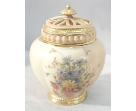A Royal Worcester blush ivory lidded pot pourri jar with floral decoration