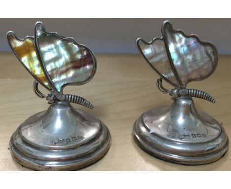 A pair of silver and mother-of-pearl card holders modelled as butterflies: Birmingham 1912: by Mappin & Webb