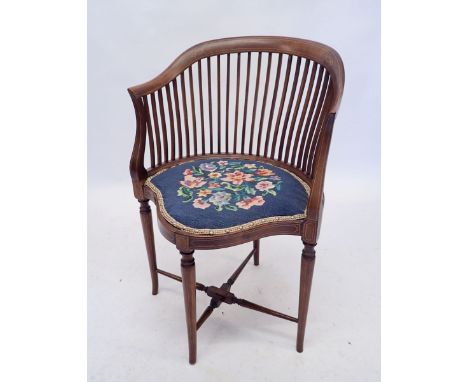 An Edwardian mahogany slat back corner chair on turned supports with tapestry sea, 140 x 67cm wide 