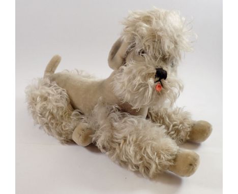 A Steiff large poodle, 40cm tall 