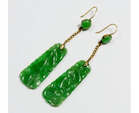 A pair of Art Deco carved jade earrings, jade panel 3.2 x 1.3cm 