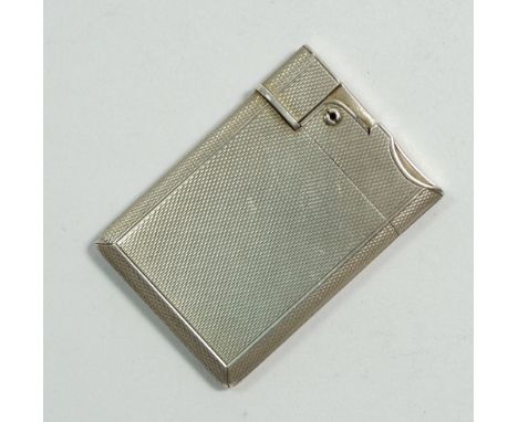 An Asprey silver wafer lighter, engine turned decoration, 45.5g, London 1955 
