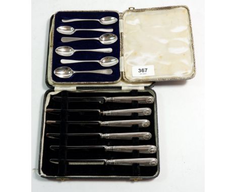 A set of six silver coffee spoons, Sheffield 1916, cased and a set of silver handled tea knives, cased 