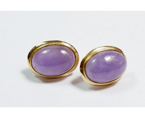A pair of 14 carat gold lilac jade oval earrings 