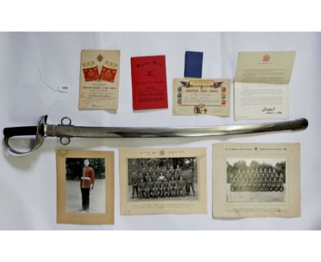 An officers cavalry sword with metal scabbard, blade 87cm long, with related military ephemera for Donald Edward Anthony John