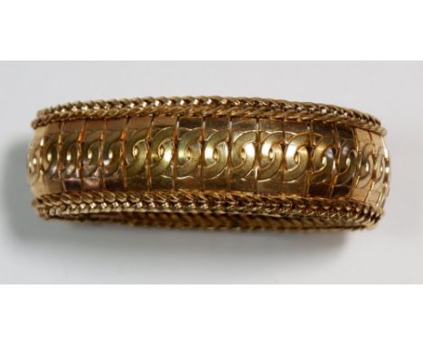 A rolled gold reticulated bangle 