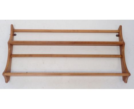 An Ercol light elm plate rack, 96.5x49cm