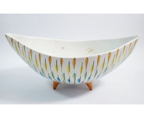 A 1950's retro Italian designed oval bowl on stick feet, 33cm across, tiny chip to glaze paint on rim, stained interior