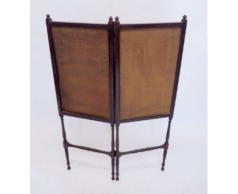 A mahogany framed folding fire screen with spindle supports, 113cm tall 