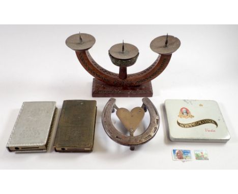 A small group of collectables including two Post Office Savings Banks, a horse shoe and heart trivet, candlestick etc. 