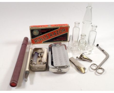 A box of collectables including medical syringe, glass bottles, bath thermometer etc. 