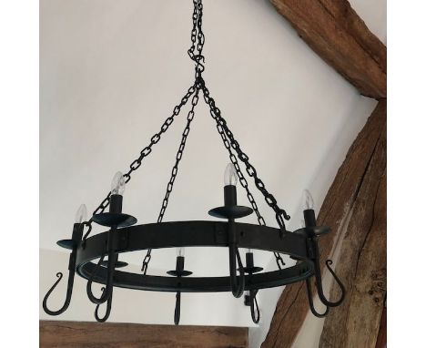 A blacksmith made large wrought iron 'Shepherd's Crook' eight light chandelier, designed and made by Nigel Tyass, Yorkshire, 