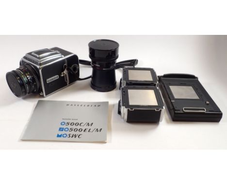 A Hasselblad 500c/m camera with accessories including Carl Zeiss lens 