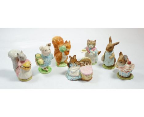 A group of seven Beswick Beatrix Potter figures of Mrs Tittlemouse, Mrs Flopsy Bunny, Hunca Munca, Ribby, Squirrel Nutkin, Li