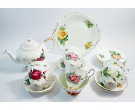 A Paragon vintage tea service comprising: teapot, jug, cake plate, sugar, six cups and saucers and six tea plates, all decora