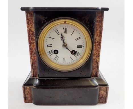 A Victorian red and black slate mantel clock, 21cm tall 