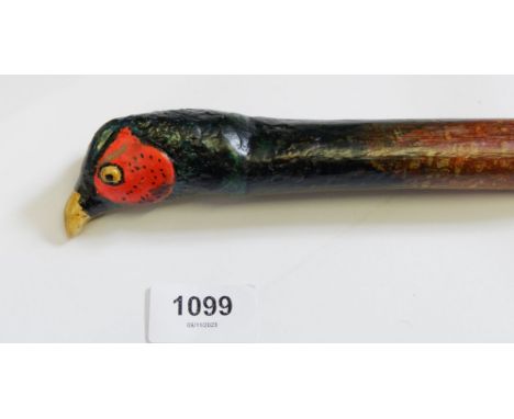 A hazel shaft walking stick with carved and painted pheasant knop, 132cm long 