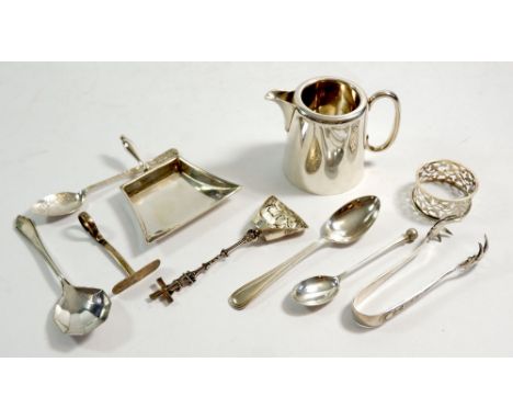 A silver napkin ring, pusher, two teaspoons and a 900 standard windmill caddy spoon, 74g and a small group of silver plated i