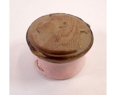 An early 19th century enamel patch box inset with Egyptian carved stone head cameo to top, 3.5cm diameter 