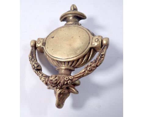 A brass rams head door knocker, 15cm tall 
