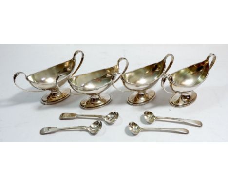 A set of four silver Regency style boat form salts with pedestal foot and looped handles, London 1907 by Haseler Brothers, pl