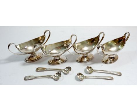 A set of four silver Regency style boat form salts with pedestal foot and looped handles, London 1907 by Haseler Brothers, pl